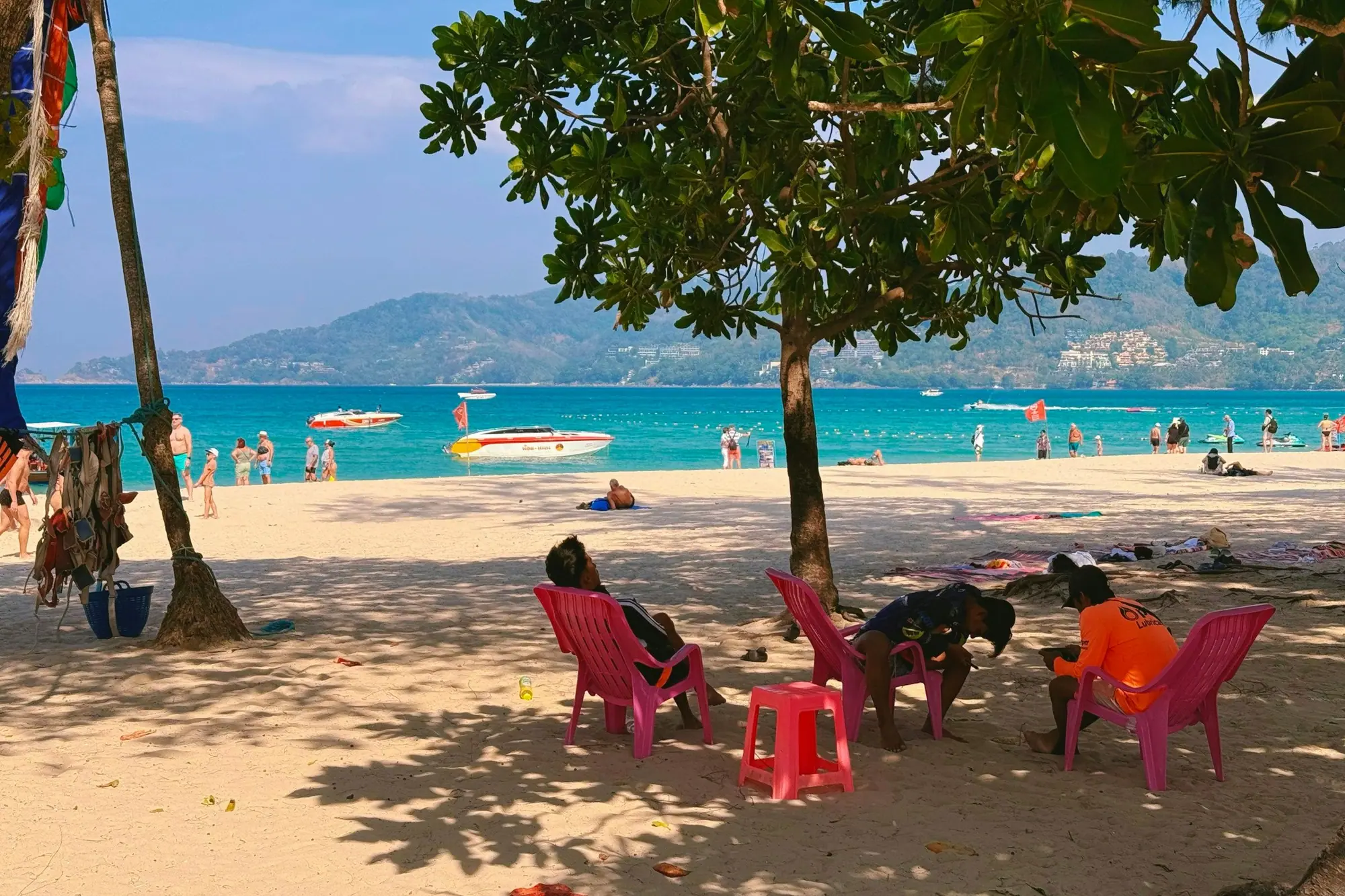 Beach chairs under the trees at Patong, Phuket