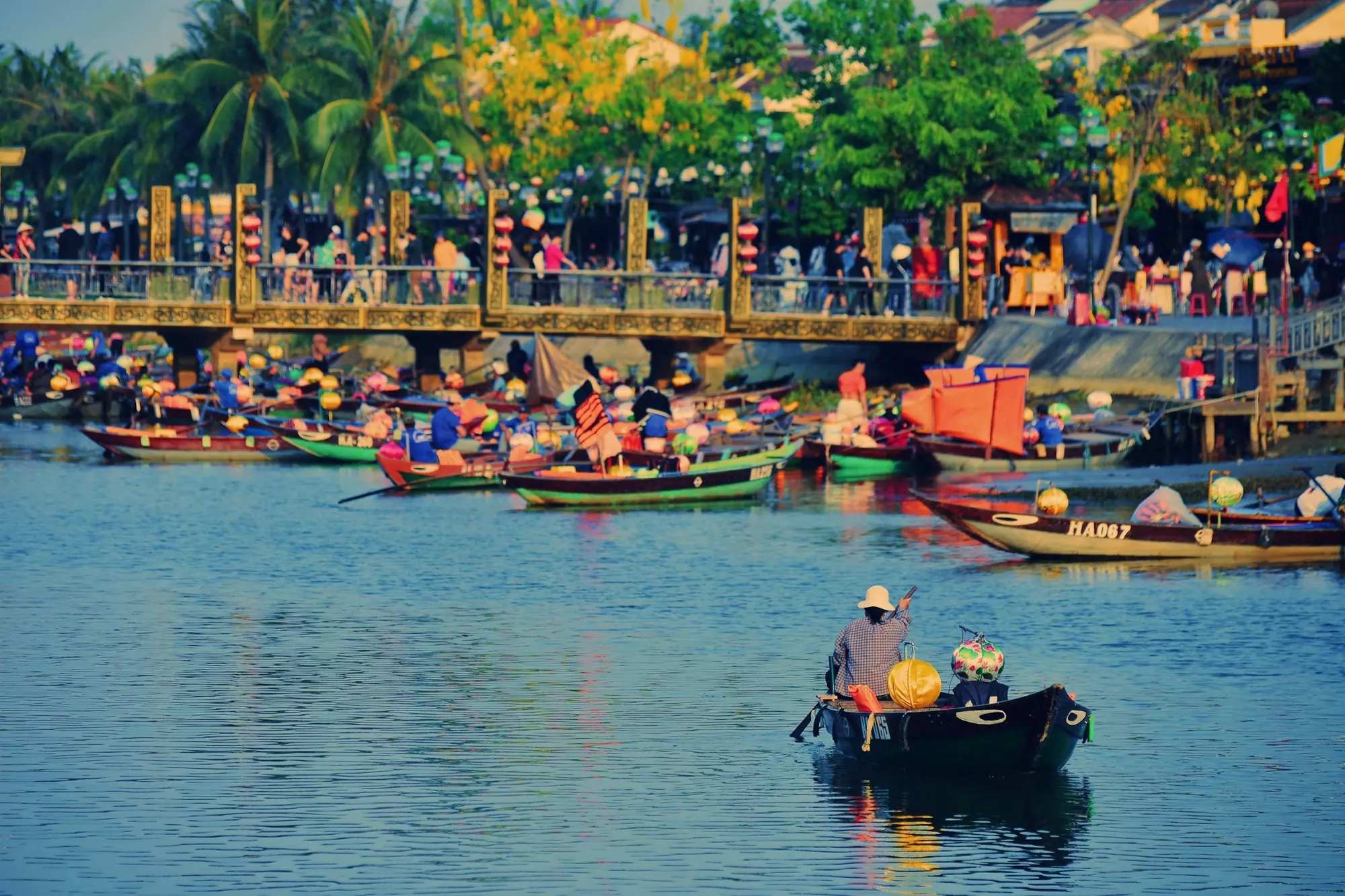 Boats on the river in the old town of Hoi An